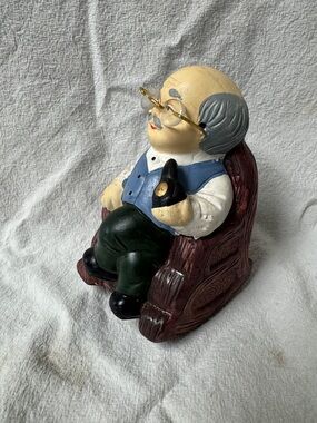 Decorative Sitting Gentleman Coin Bank Figurine in Blue, Green, and Brown